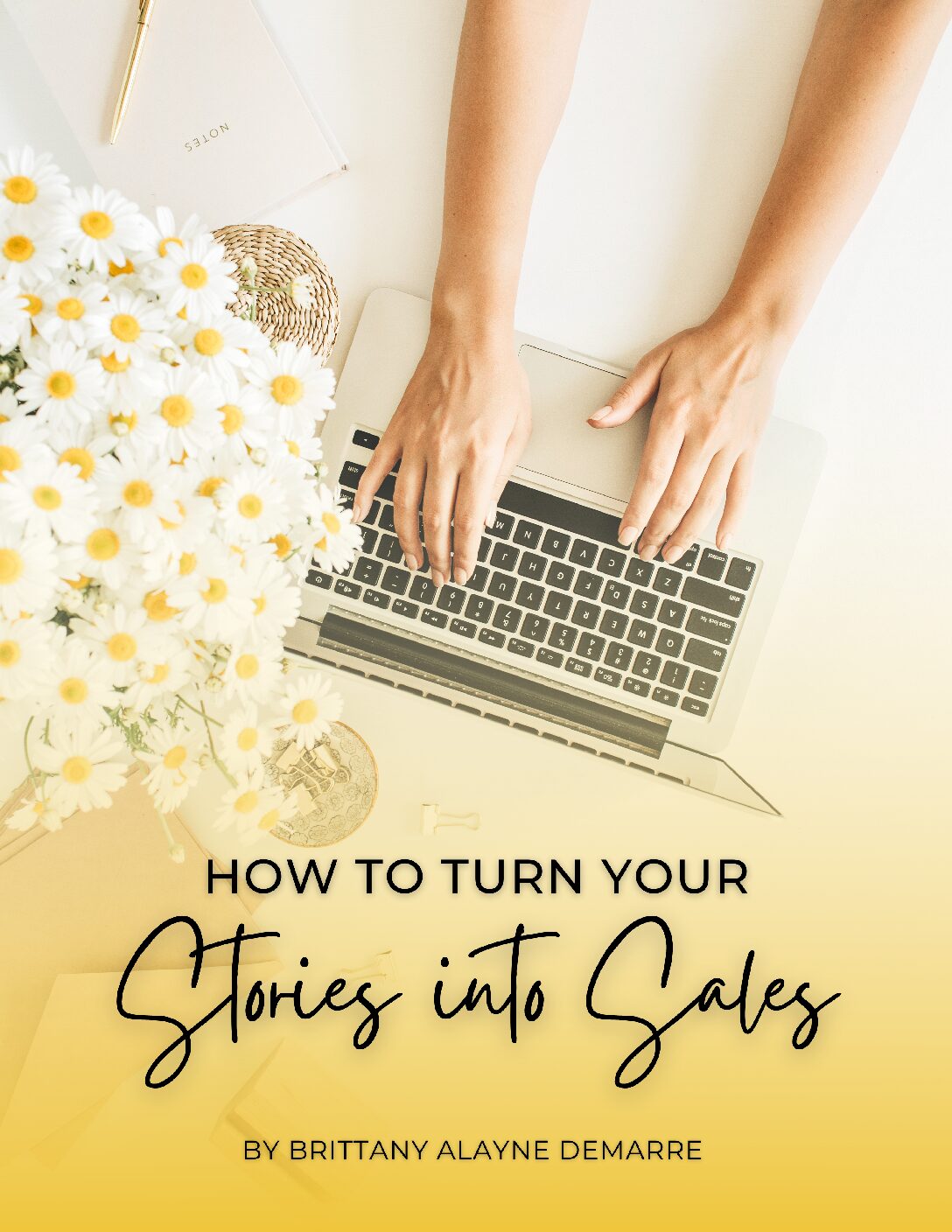 Yellow ebook cover features lovely daisies & a view of hands typing on a Macbook, symbolizing self-publishing a book.